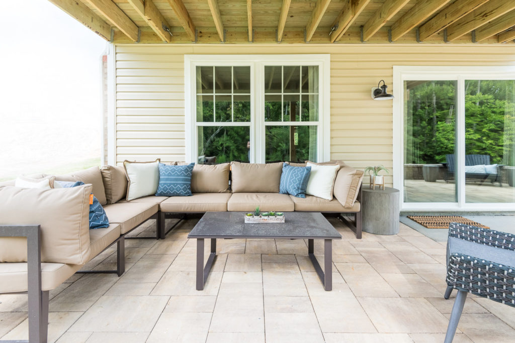 model home covered patio outdoor living seating